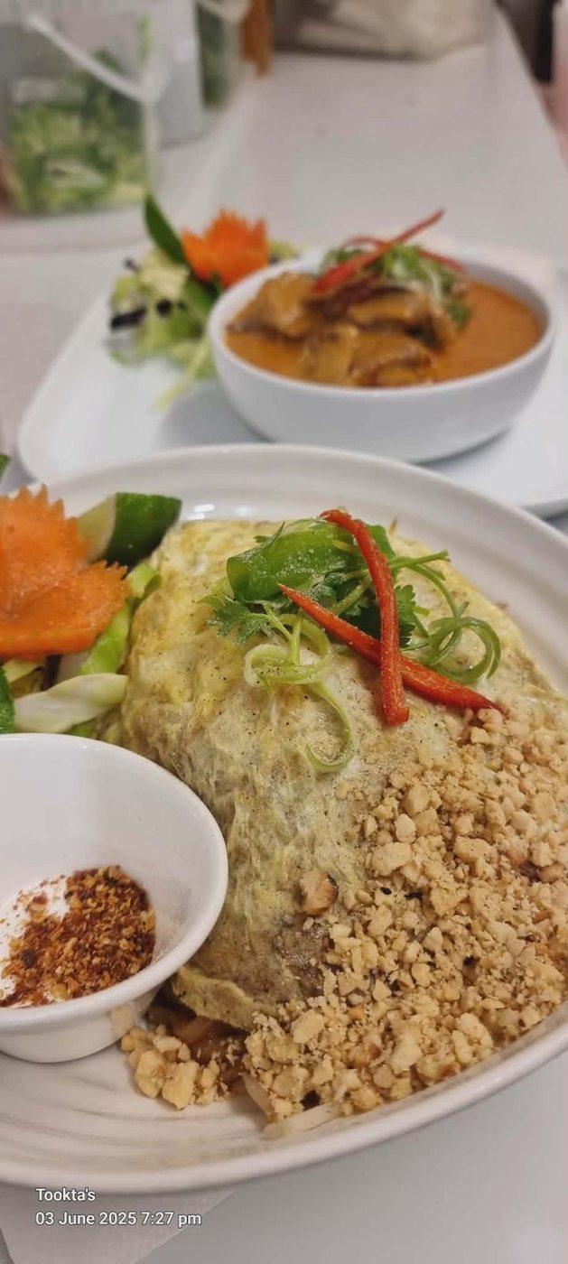 Pad Thai — stir-fried rice noodles with tamarind, peanuts and chilli flakes